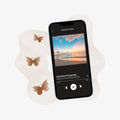 Phone displaying a music app with butterflies and wavy sound wave lines on a light background